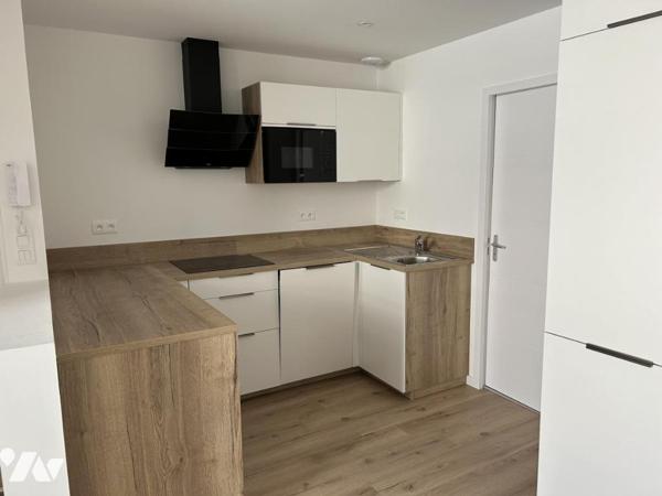 Appartement centre ville - Batiment refait à neuf