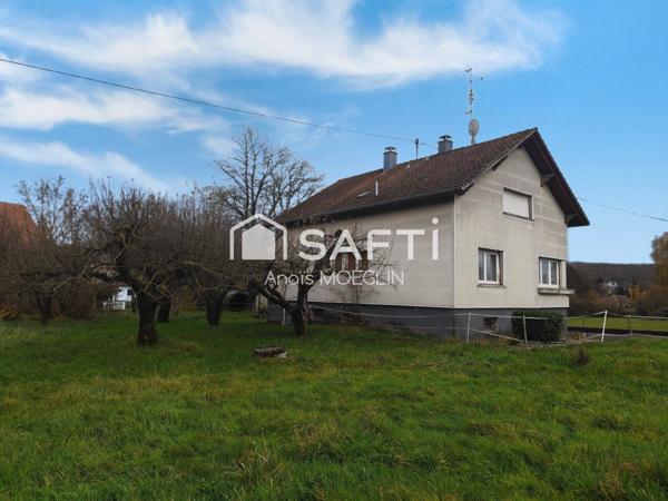 Maison individuelle de 110 m2, cave et dépendance.
