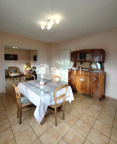 Maison individuelle de 110 m2, cave et dépendance.