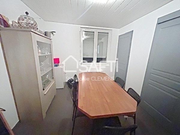 Investissez dans cette maison, idéalement située à Raimbeaucourt avec une rentabilité locative garantie