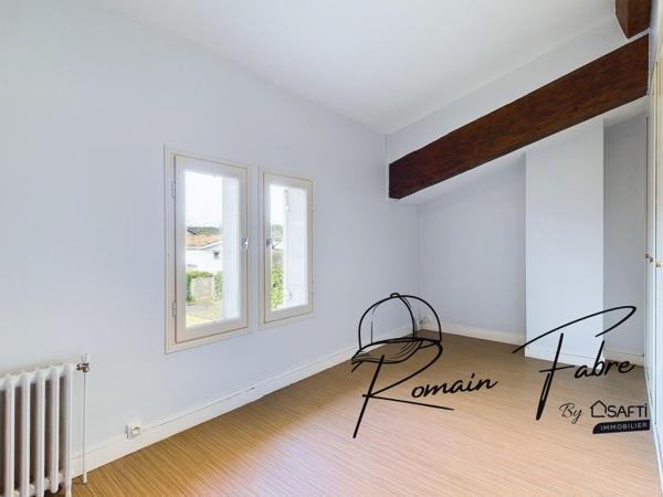 Immeuble avec Logements de 5 chambres et 2 commerces loués centre Cavignac, rentabilité importante