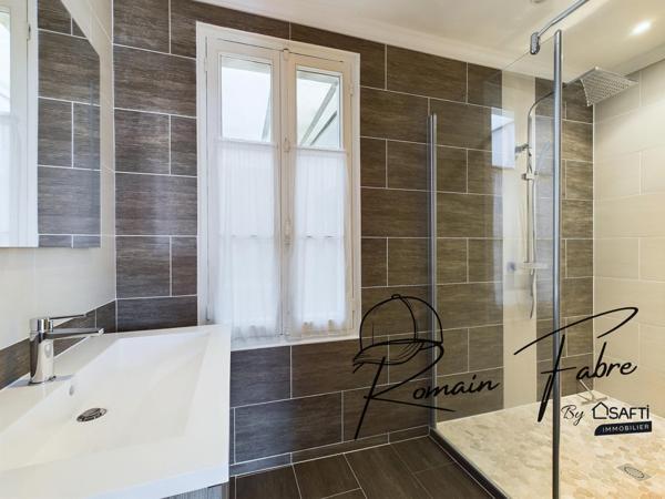 Immeuble avec Logements de 5 chambres et 2 commerces loués centre Cavignac, rentabilité importante