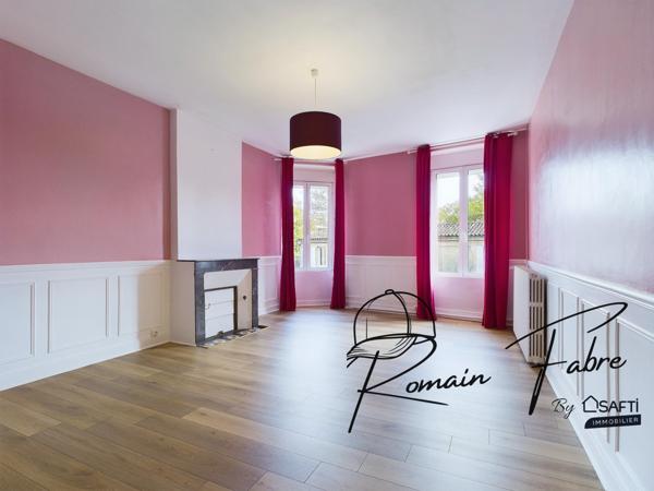 Immeuble avec Logements de 5 chambres et 2 commerces loués centre Cavignac, rentabilité importante