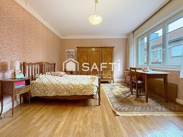 grande maison jumelée