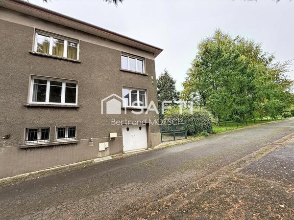 grande maison jumelée