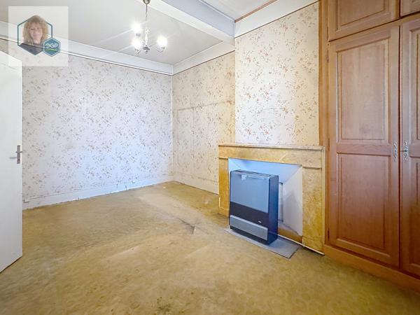 MAISON DE VILLE DES ANNÉES 30 AVEC JARDIN ET POTENTIEL D’AMÉNAGEMENT