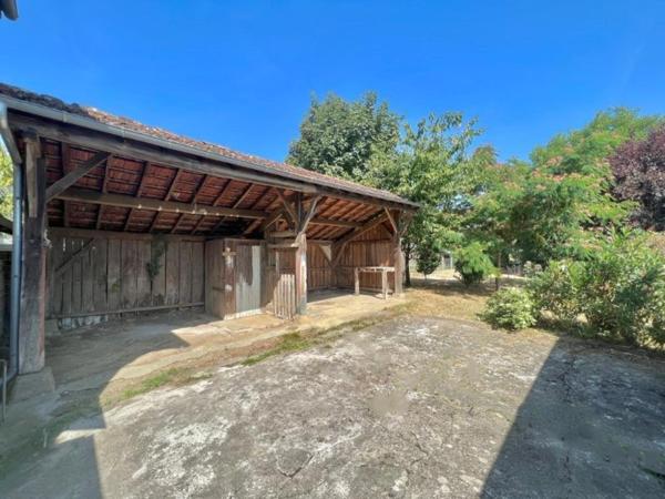 MAISON 2 LOGEMENTS PROCHE CENTRE AVEC GRAND JARDIN ET PUITS