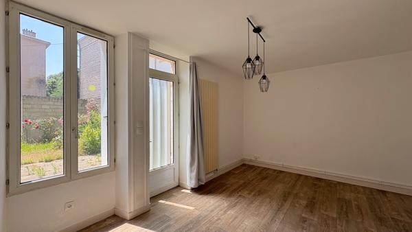 NIORT - Quartier hôpital appartement rez-de-chaussée de 56m² avec cour et garage
