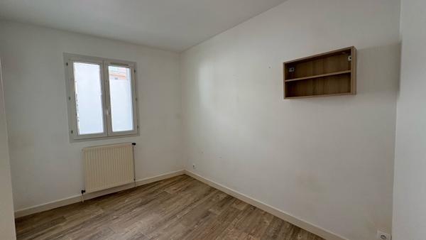 NIORT - Quartier hôpital appartement rez-de-chaussée de 56m² avec cour et garage