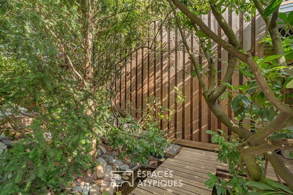 Maison des années 60 rénovée et son jardin arboré