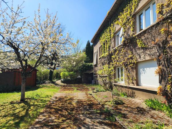 Maison spacieuse avec jardin
