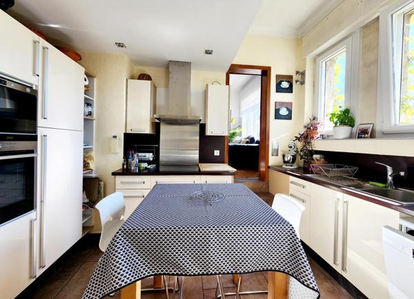 Maison spacieuse avec jardin