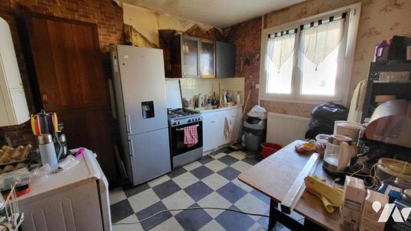 Valentigney, maison mitoyenne des deux côtés, cinq pièces 100m2 sur 5a 55ca.