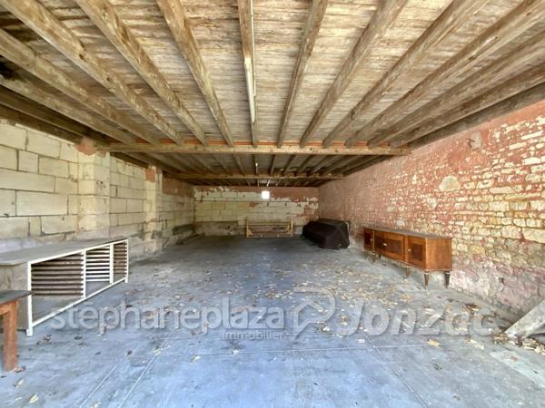 Grand Immeuble avec nombreuses possibilités