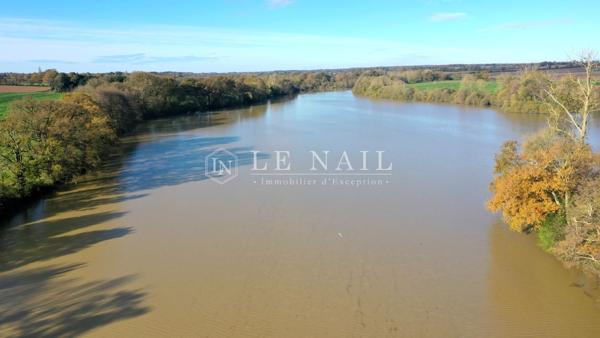 Rare étang de 15 hectares et son moulin en Sud Mayenne