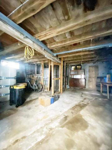 Maison Brassagaise au coeur du village avec double garages et cour interieur