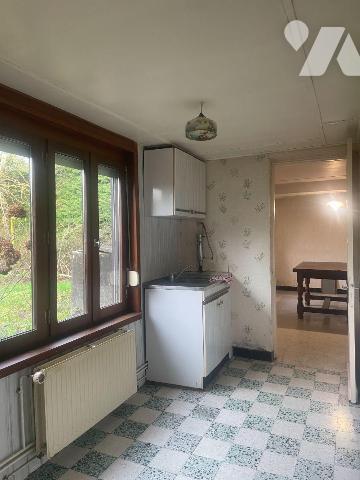 A VENDRE A STEENVOORDE DANS LE NORD (59) - MAISON SEMI-PLAIN-PIED - UNE MITOYENNETE AVEC JARDIN...