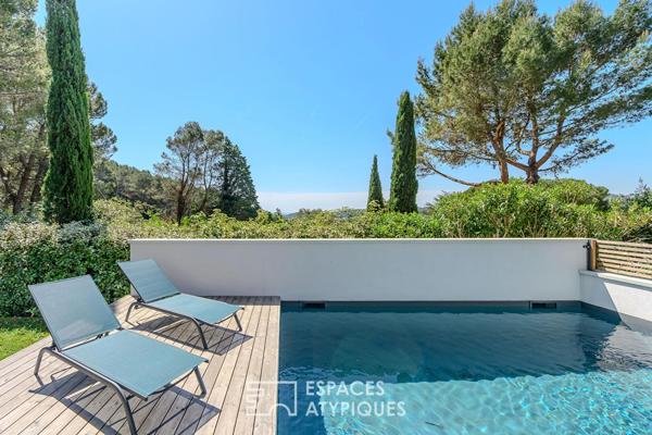 Cocon contemporain niché dans un écrin de verdure avec vue imprenable