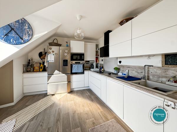 Appartement 5 pièces 96 m² + 20 m² de terrasse + 3 places de stationnement