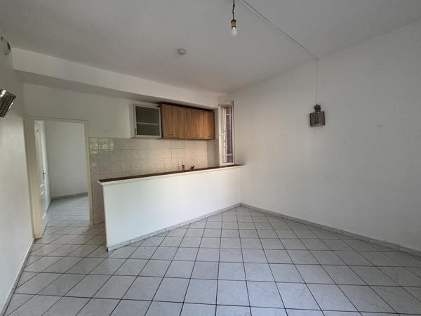 LOCATION - 69008 LYON Appartement T2 de 36,51 m² rez de jardin - petit immeuble