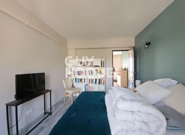 Magnifique T4 de 87m² avec terrasse de 80m² - Proximité Centre-ville - Résidence sécurisée avec ascenseur et garage !