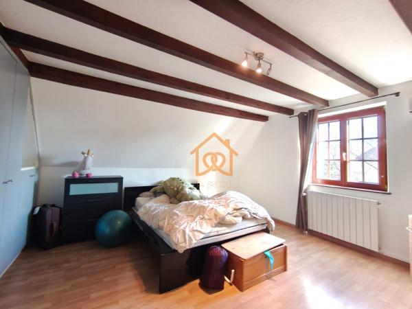 En exclusivité Jolie Maison de 150m² au sol à HOLTZHEIM avec piscine chauffée, climatisation sur 7 ares de terrain