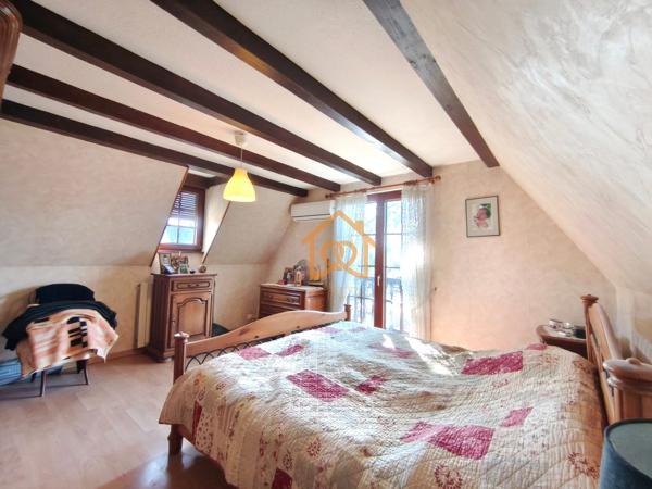 En exclusivité Jolie Maison de 150m² au sol à HOLTZHEIM avec piscine chauffée, climatisation sur 7 ares de terrain