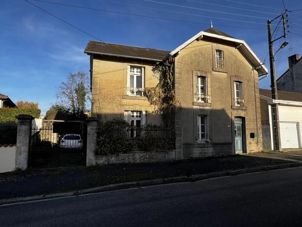 Imposante maison individuelle à rénover au centre-ville