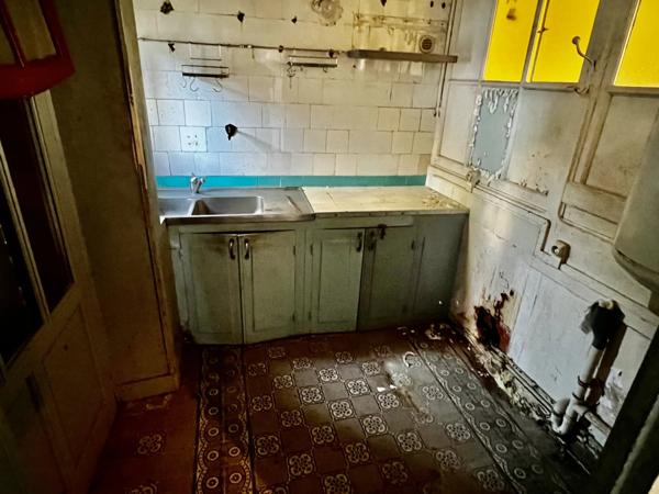 Imposante maison individuelle à rénover au centre-ville