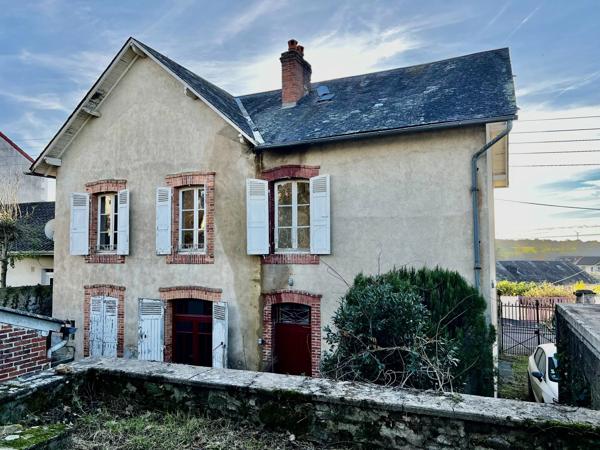 Imposante maison individuelle à rénover au centre-ville