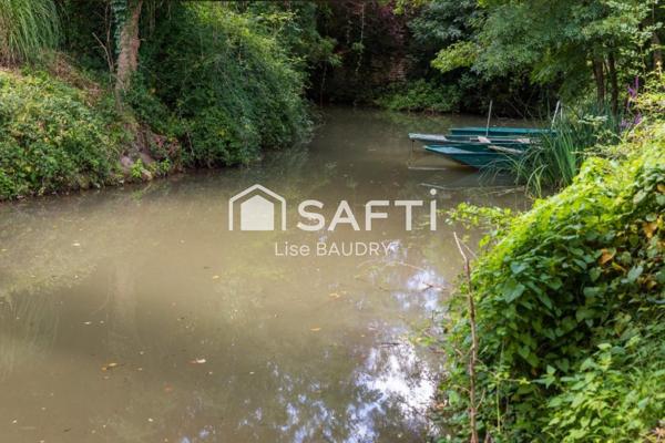 Maison avec port privé sur conche (petit canal)