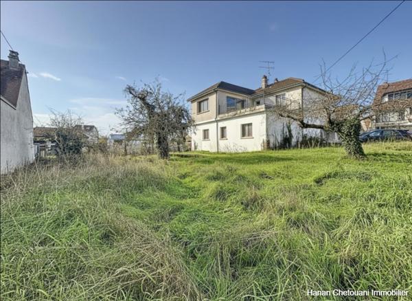 Centre-ville d'Igny Local commercial + F4 + Terrain constructible de 665 m² ? Projet collectif possible !