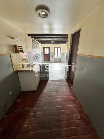 Maison avec beau potentiel locatif.