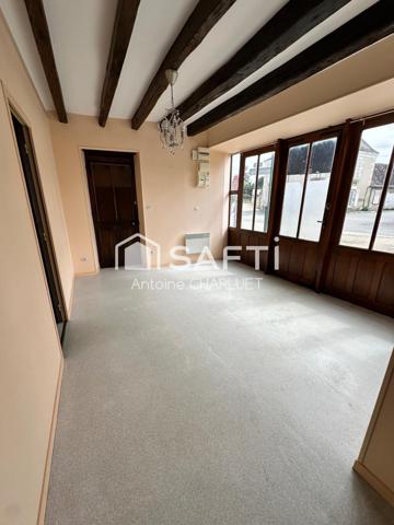 Maison avec beau potentiel locatif.