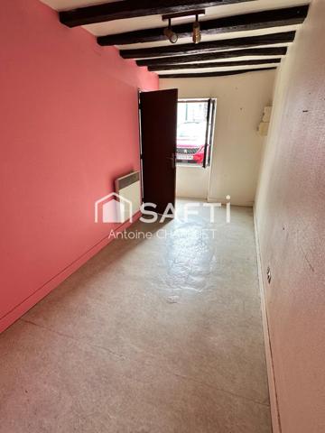 Maison avec beau potentiel locatif.