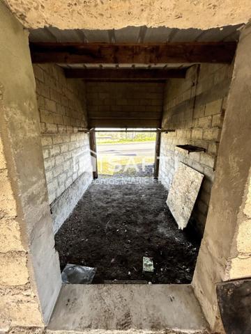 Garage avec cave, remise et terrasse