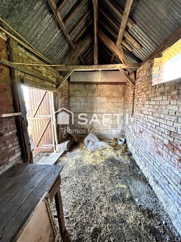 Garage avec cave, remise et terrasse
