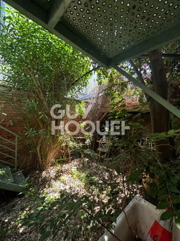 Maison à vendre à Perpignan - Quartier Arago - grand garage - jardin