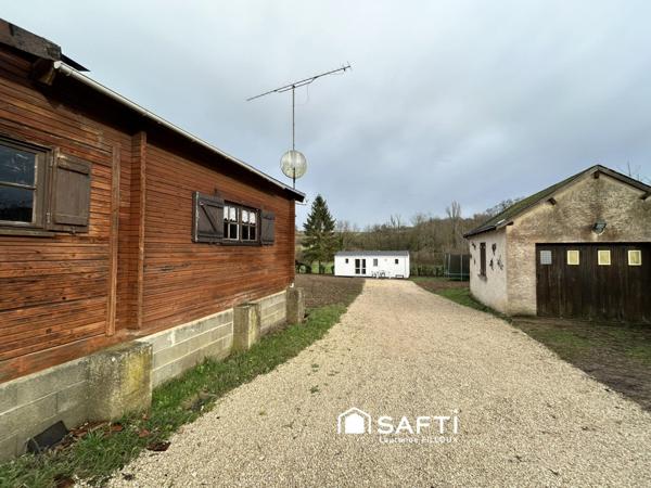 Mobil-Home, chalet et garage sur un terrain de 1115 m²