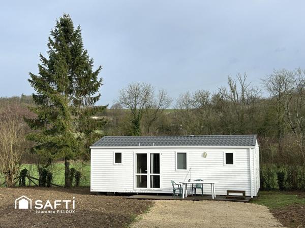 Mobil-Home, chalet et garage sur un terrain de 1115 m²
