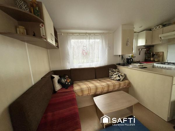 Mobil-Home, chalet et garage sur un terrain de 1115 m²