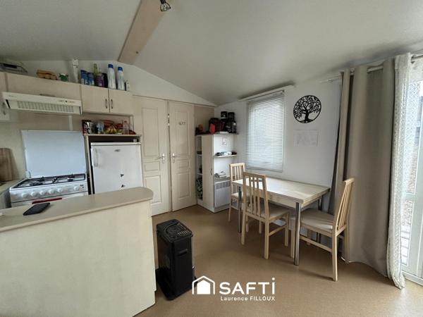 Mobil-Home, chalet et garage sur un terrain de 1115 m²