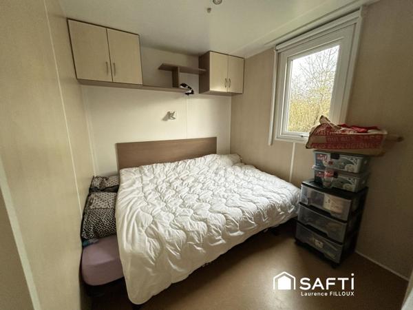 Mobil-Home, chalet et garage sur un terrain de 1115 m²