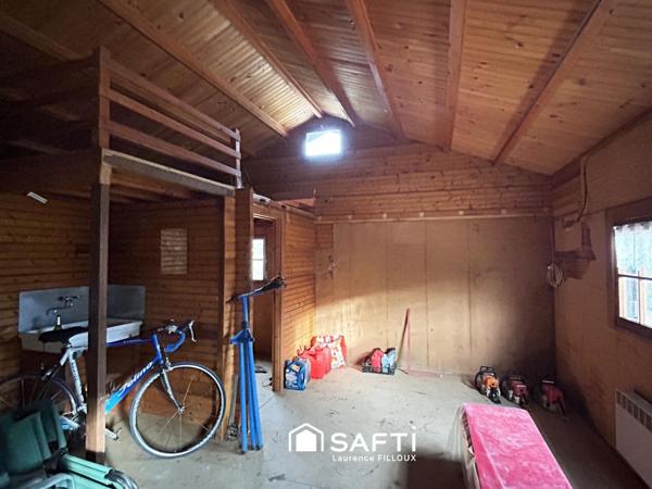 Mobil-Home, chalet et garage sur un terrain de 1115 m²