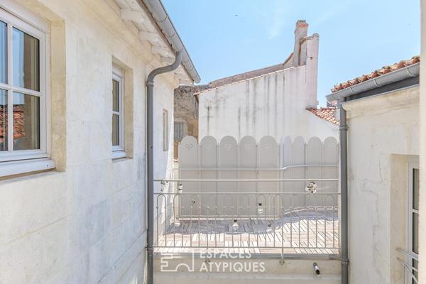 Triplex avec terrasses dans une bâtisse historique