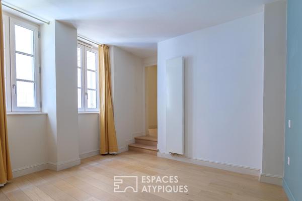 Triplex avec terrasses dans une bâtisse historique