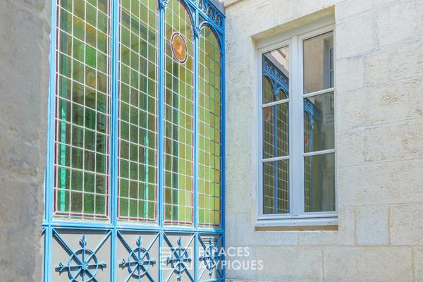 Triplex avec terrasses dans une bâtisse historique