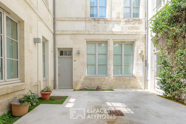 Triplex avec terrasses dans une bâtisse historique