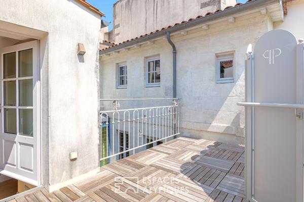 Triplex avec terrasses dans une bâtisse historique