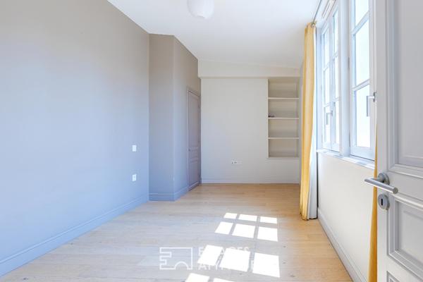 Triplex avec terrasses dans une bâtisse historique